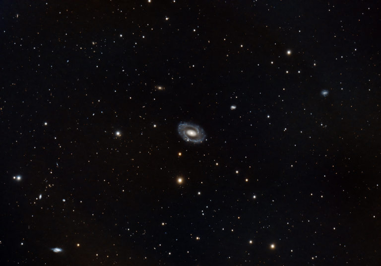 NGC210 is getting photobombed.
